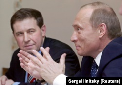 Президент Росії Володимир Путін (праворуч) і його радник з економічних питань Андрій Ілларіонов. Москва, 9 квітня 2004 року