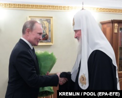 Президент Росії Володимир Путін і Московський партіарх Кирило